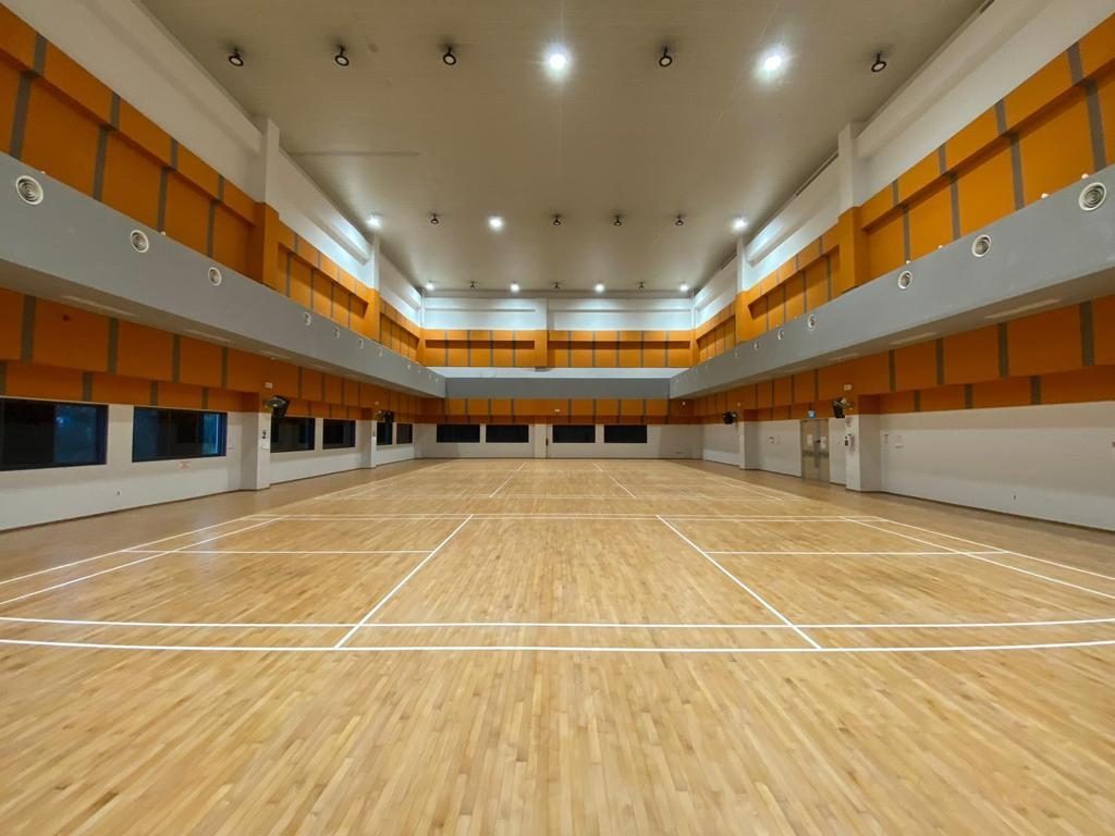 SAFRA Toa Payoh Oak parquet sports floor — block replacement, sanding and sports-use varnish refinish