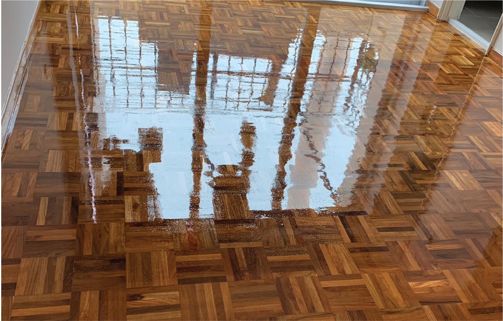 Water damage to parquet and wood flooring — assessment and repair